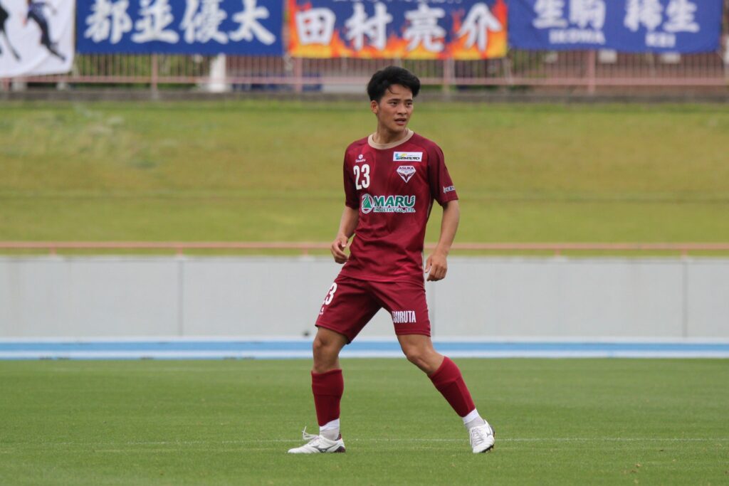 関選手